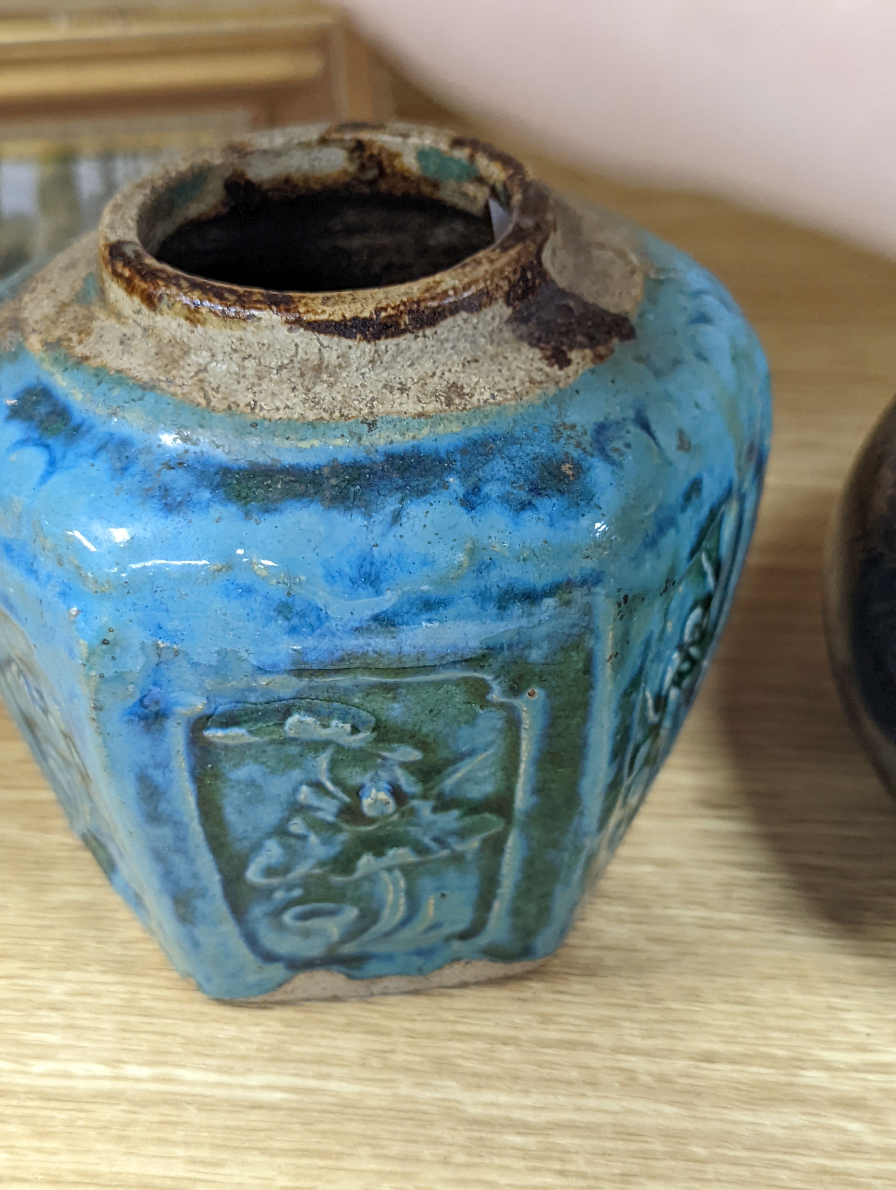 Two Chinese bronze handwarmers and a turquoise glazed jar